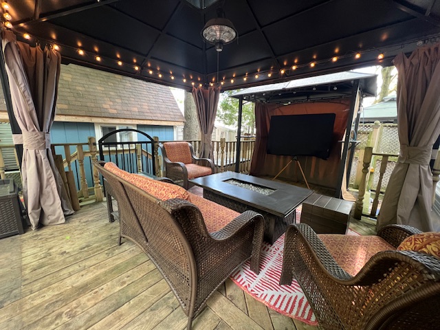 Hard top gazebo, 10x12’ mosquito screens & curtains around cozy