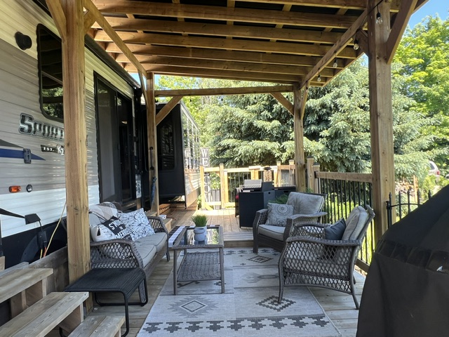 Under hard awning over the entire deck are