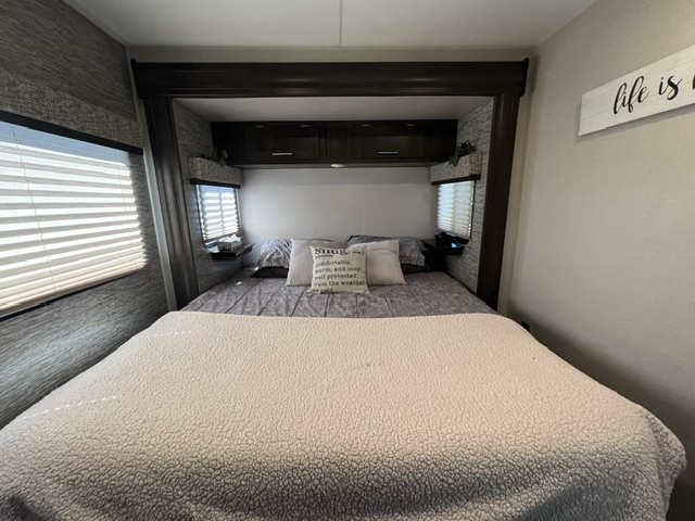 Master bedroom with storage units & dresser